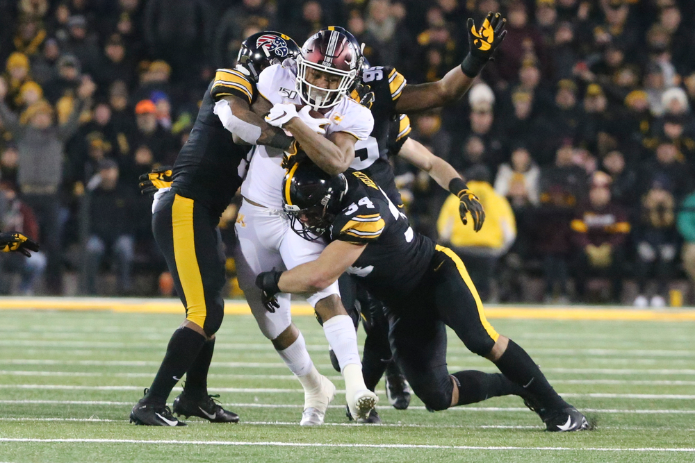 Iowa Hawkeyes linebacker Kristian Welch (34) and Iowa Hawkeyes defensive back Geno Stone (9) during Iowa football vs Minnesota on Saturday, November 16, 2019 at Kinnick Stadium. (Lily Smith/hawkeyesports.com)