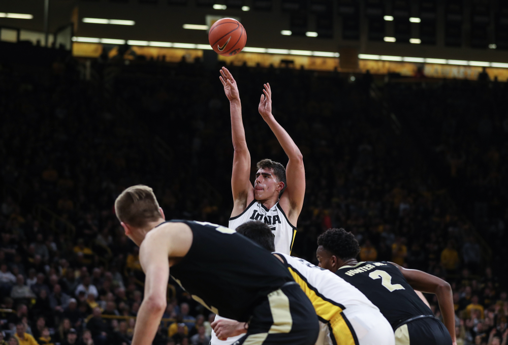 Iowa Hawkeyes forward Luka Garza (55) sets the school record for most points in a season against the Purdue Boilermakers Tuesday, March 3, 2020 at Carver-Hawkeye Arena. (Brian Ray/hawkeyesports.com)