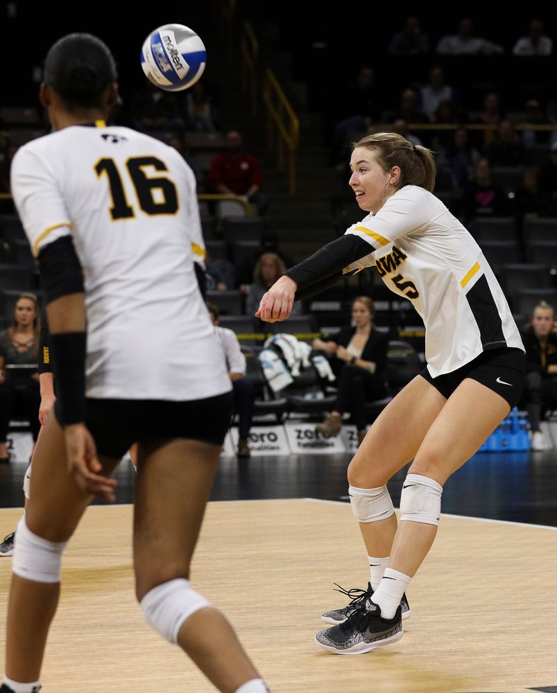 Iowa Hawkeyes outside hitter Meghan Buzzerio (5) bumps the ball during a match against Nebraska at Carver-Hawkeye Arena on November 7, 2018. (Tork Mason/hawkeyesports.com)