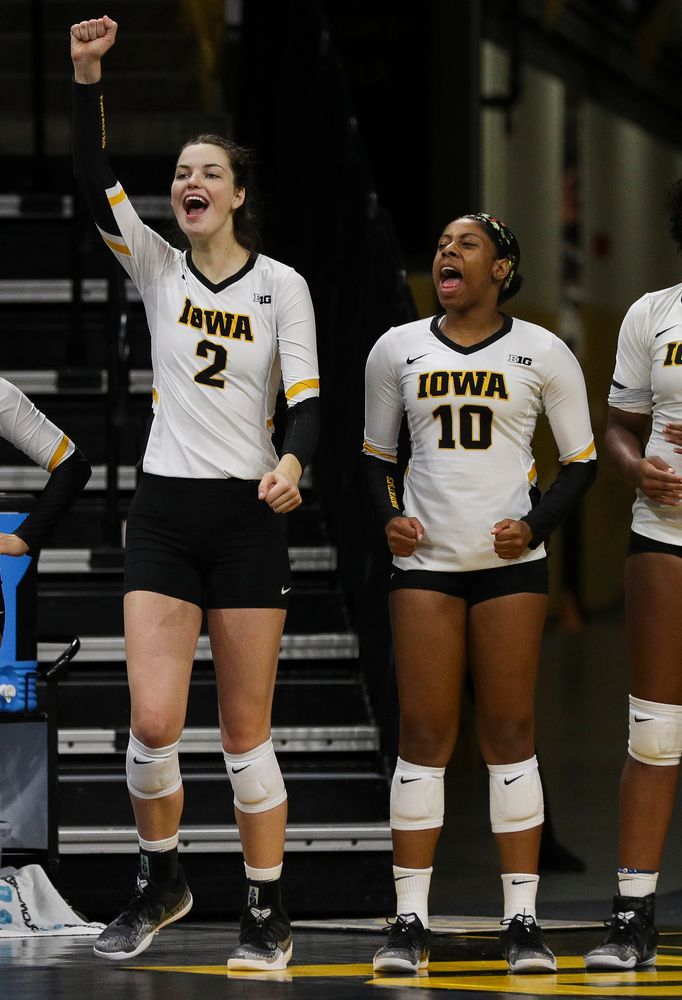 Iowa Hawkeyes setter Courtney Buzzerio (2) and Iowa Hawkeyes outside hitter Griere Hughes (10) react on the bench during a match against Nebraska at Carver-Hawkeye Arena on November 7, 2018. (Tork Mason/hawkeyesports.com)