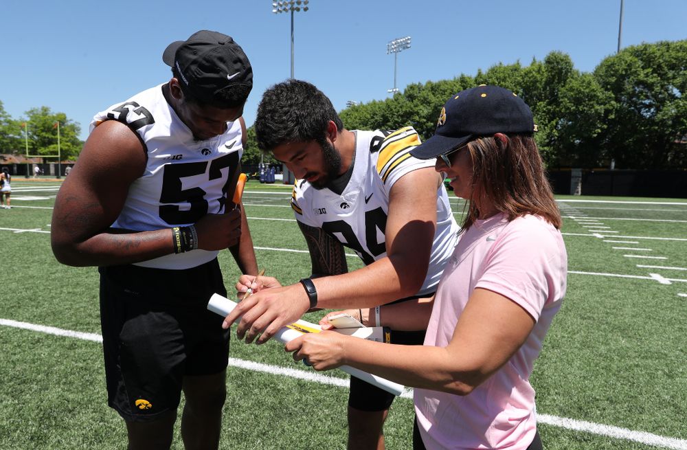 Iowa Hawkeyes defensive end A.J. Epenesa (94) and defensive end Chauncey Golston (57) during the 2019 Iowa Ladies Football Academy Saturday, June 8, 2019 at the Hansen Football Performance Center. (Brian Ray/hawkeyesports.com)