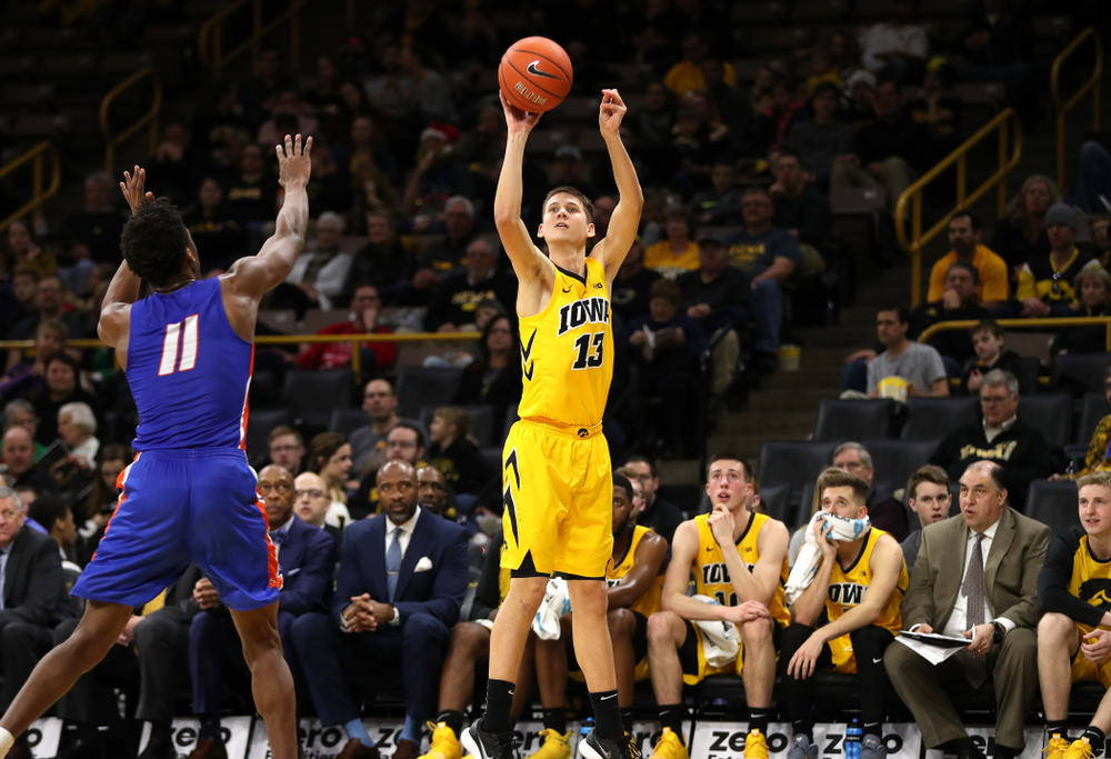 Iowa Hawkeyes guard Austin Ash (13) against the Savannah State Tigers Saturday, December 22, 2018 at Carver-Hawkeye Arena. (Brian Ray/hawkeyesports.com)
