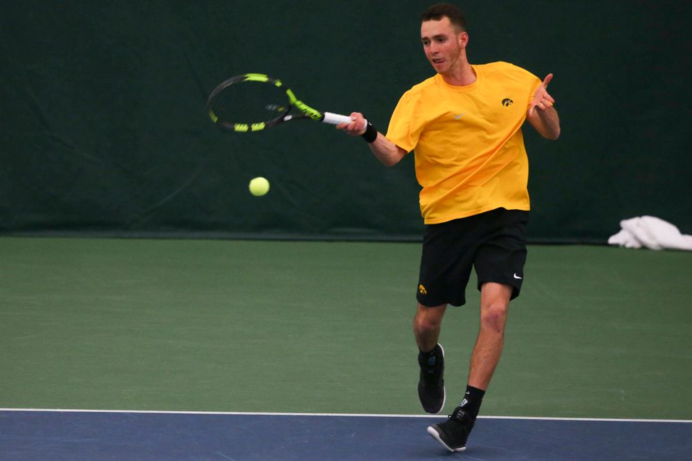Iowa's Kareem Allaf at a tennis match vs Drake Friday, March 8, 2019 at the Hawkeye Tennis and Recreation Complex. (Lily Smith/hawkeyesports.com)