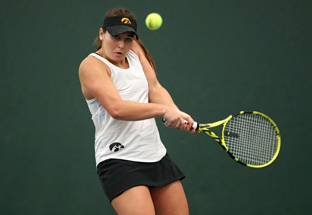 Iowa’s Danielle Bauers returns a shot during her singles match at the Hawkeye Tennis and Recreation Complex in Iowa City on Sunday, February 23, 2020. (Stephen Mally/hawkeyesports.com)