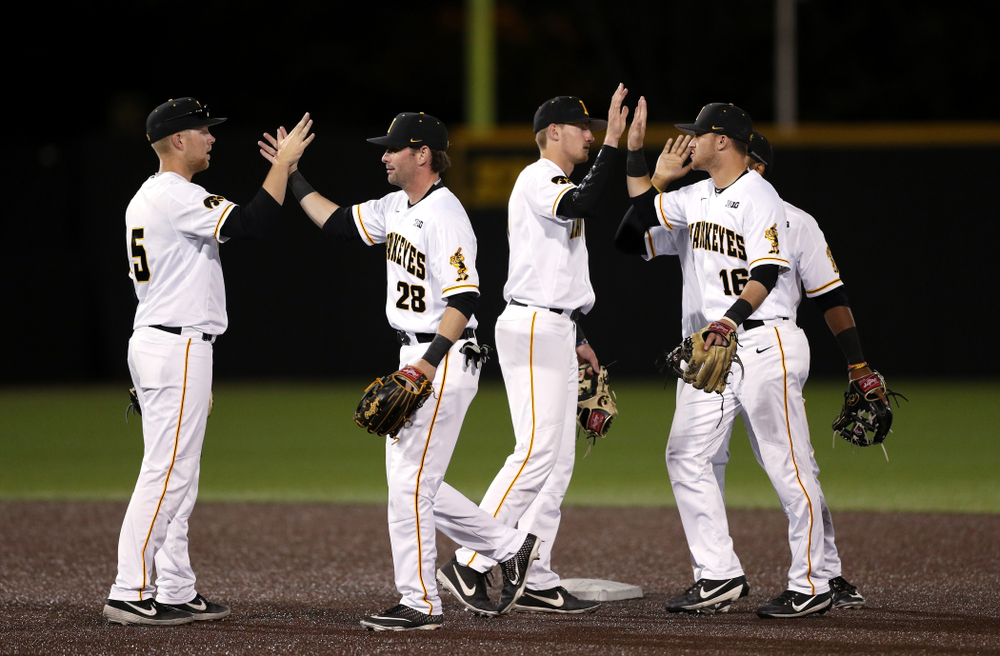 Iowa Hawkeyes Zeb Adreon (5) and Chris Whelan (28) against the Michigan State Spartans Friday, May 10, 2019 at Duane Banks Field. (Brian Ray/hawkeyesports.com)