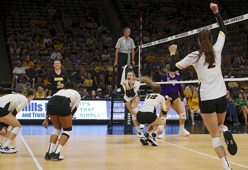 Iowa’s Meghan Buzzerio (5), Halle Johnston (4), Brie Orr (7), Kyndra Hansen (8), Hannah Clayton (18) and Courtney Buzzerio (2) celebrate a score during their Big Ten/Pac-12 Challenge match at Carver-Hawkeye Arena in Iowa City on Saturday, Sep 7, 2019. (Stephen Mally/hawkeyesports.com)