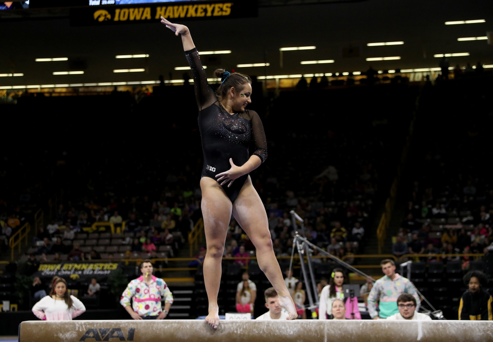 Iowa’s Dani Castillo competes on the beam against Michigan Friday, February 14, 2020 at Carver-Hawkeye Arena. (Brian Ray/hawkeyesports.com)