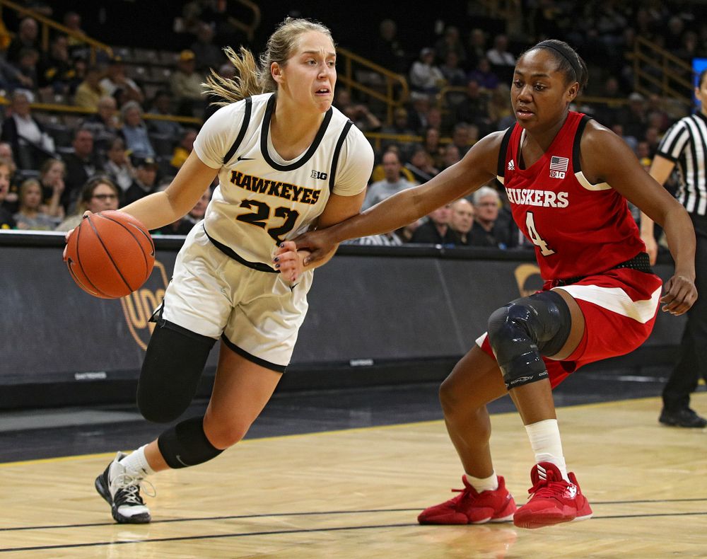 Iowa Hawkeyes guard Kathleen Doyle (22) drives in with the ball during the first quarter of the game at Carver-Hawkeye Arena in Iowa City on Thursday, February 6, 2020. (Stephen Mally/hawkeyesports.com)