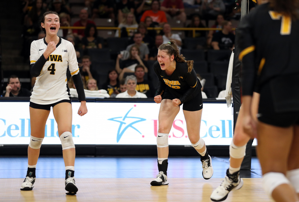 Iowa Hawkeyes defensive specialist Halle Johnston (4) and outside hitter Edina Schmidt (20) against the Iowa State Cyclones Saturday, September 21, 2019 at Carver-Hawkeye Arena. (Brian Ray/hawkeyesports.com)