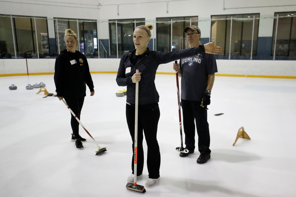 Members of the Iowa Softball team learn the sport of curling as part of a team building event Wednesday, January 10, 2018 at the Cedar Rapids Ice Arena. (Brian Ray/hawkeyesports.com)