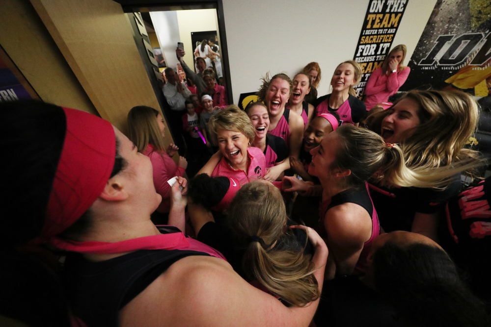The Iowa Hawkeyes celebrate with head coach Lisa Bluder following their win over the seventh ranked Maryland Terrapins Sunday, February 17, 2019 at Carver-Hawkeye Arena. (Brian Ray/hawkeyesports.com)