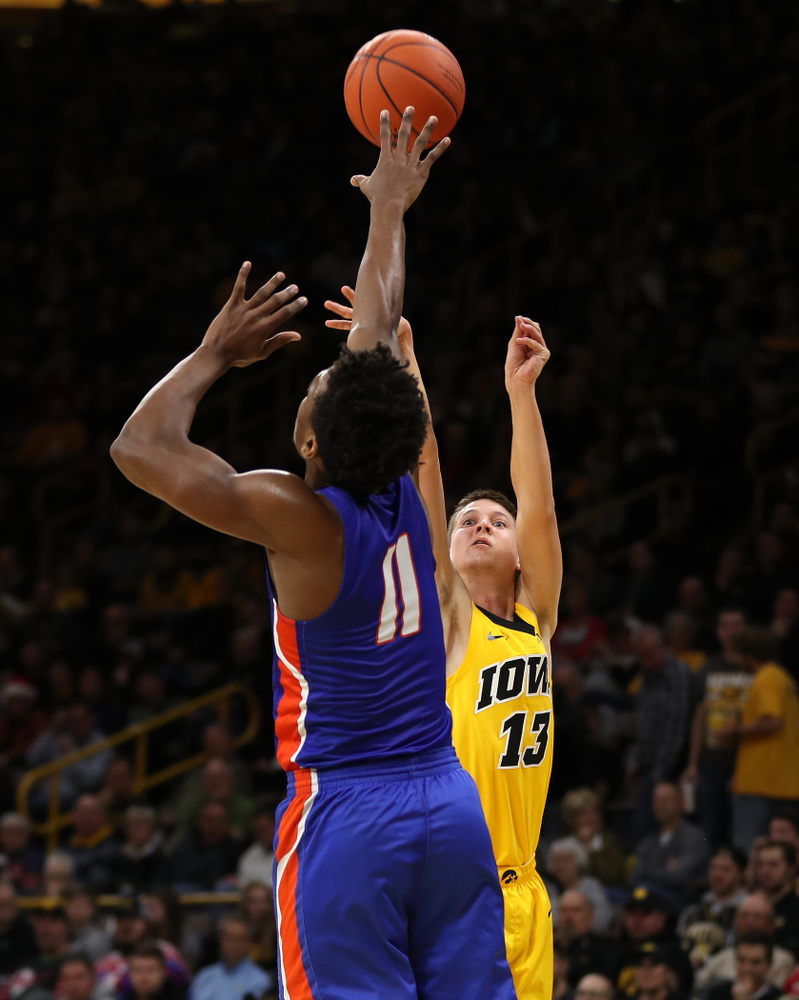 Iowa Hawkeyes guard Austin Ash (13) against the Savannah State Tigers Saturday, December 22, 2018 at Carver-Hawkeye Arena. (Brian Ray/hawkeyesports.com)