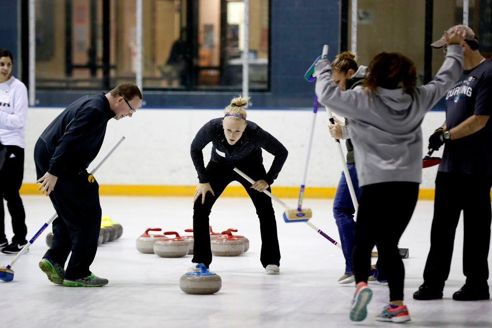 Members of the Iowa Softball team learn the sport of curling as part of a team building event Wednesday, January 10, 2018 at the Cedar Rapids Ice Arena. (Brian Ray/hawkeyesports.com)
