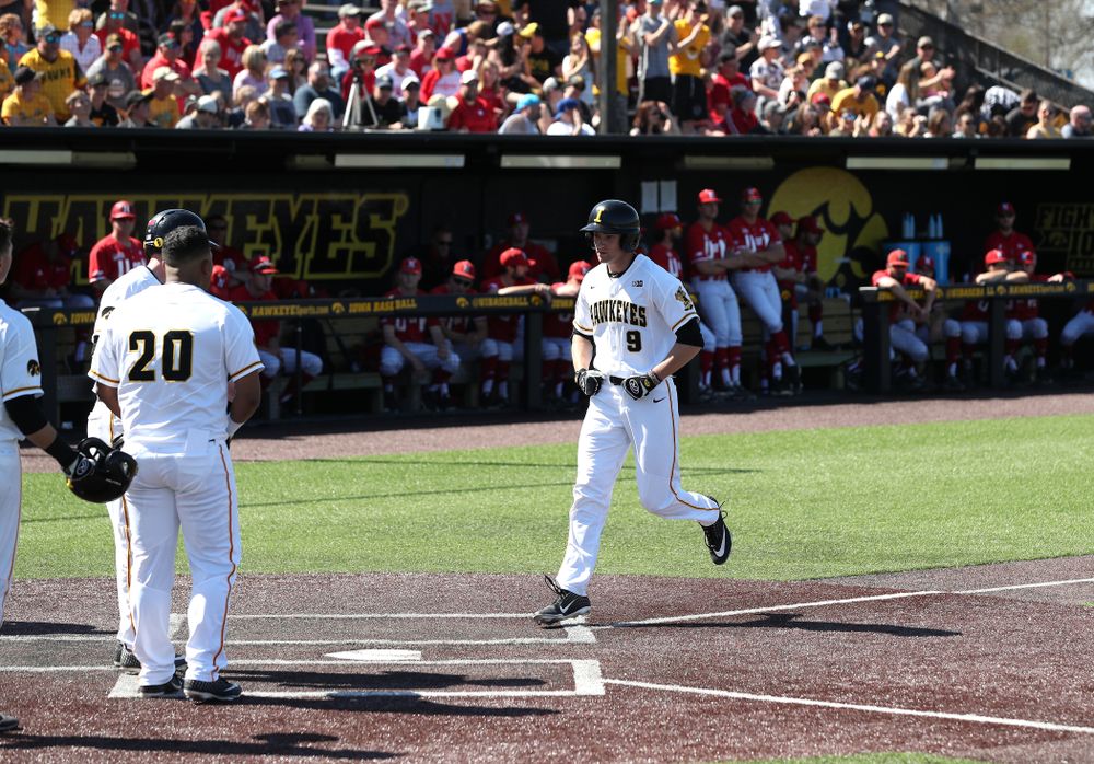 Iowa Hawkeyes outfielder Ben Norman (9) celebrates after hitting a home run against the Nebraska Cornhuskers Saturday, April 20, 2019 at Duane Banks Field. (Brian Ray/hawkeyesports.com)