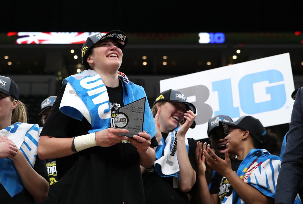 Iowa Hawkeyes forward Megan Gustafson (10) receives the Most Outstanding Player Award following their win against the Maryland Terrapins Sunday, March 10, 2019 at Bankers Life Fieldhouse in Indianapolis, Ind. (Brian Ray/hawkeyesports.com)