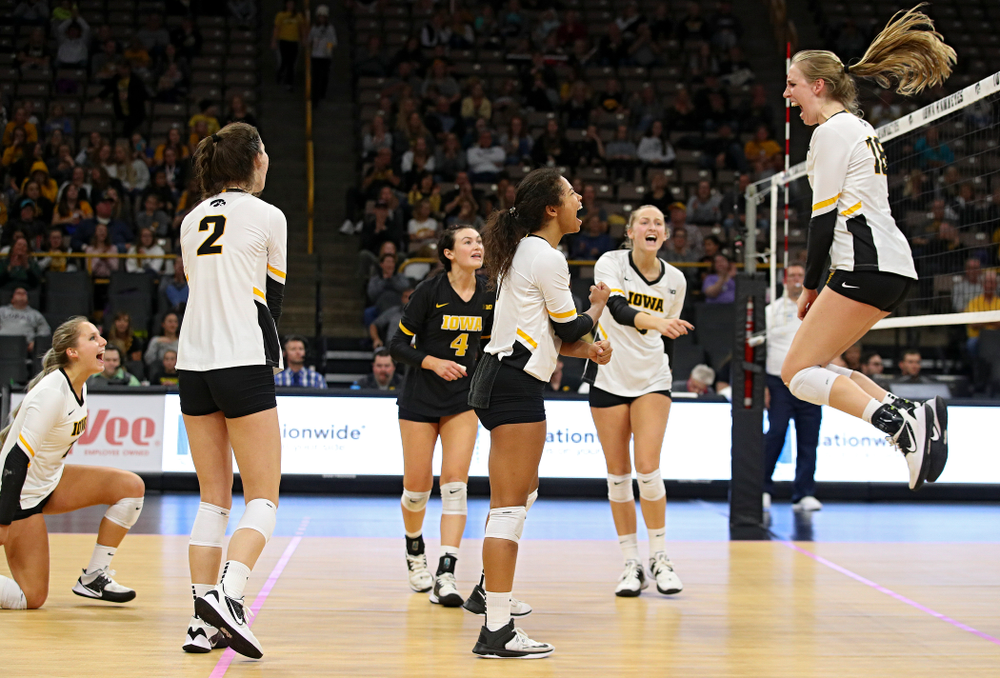 Iowa’s Maddie Slagle (15), Courtney Buzzerio (2), Halle Johnston (4), Brie Orr (7), Kyndra Hansen (8), and Hannah Clayton (18) celebrate a score during the fourth set of their volleyball match at Carver-Hawkeye Arena in Iowa City on Sunday, Oct 13, 2019. (Stephen Mally/hawkeyesports.com)