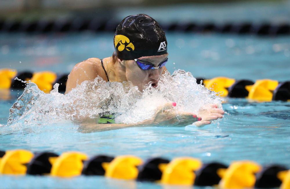 Iowa's Sage Ohlensehlen swims the breaststroke leg of the 200 yard medley relay during a double dual against Wisconsin and Northwestern Saturday, January 19, 2019 at the Campus Recreation and Wellness Center. (Brian Ray/hawkeyesports.com)