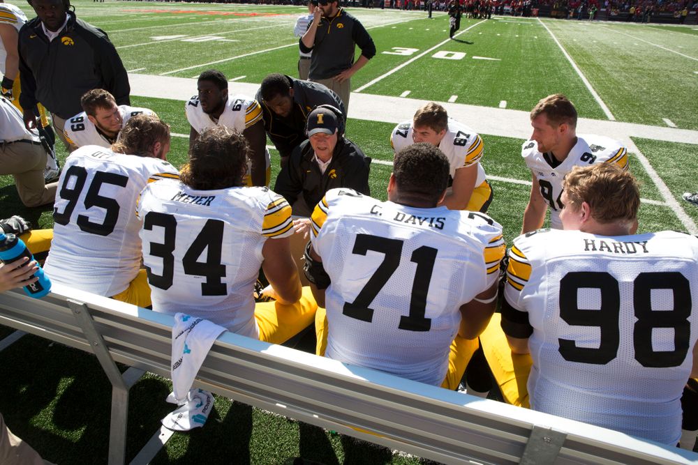 Iowa Hawkeyes defensive line coach Reese Morgan talks with his unit during the first half of their game against the Maryland Terrapins Saturday, Oct. 18, 2014 at Byrd Stadium in College Park, Md. (Brian Ray/hawkeyesports.com)