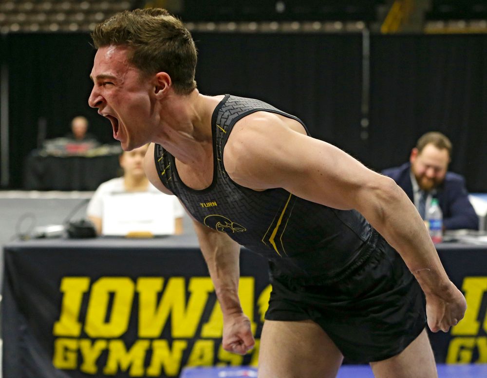 Iowa's Jake Brodarzon competes in the vault against Ohio State at Caver-Hawkeye Arena in Iowa City on Saturday, Mar. 16, 2019. (Stephen Mally for HawkeyeSports.com)