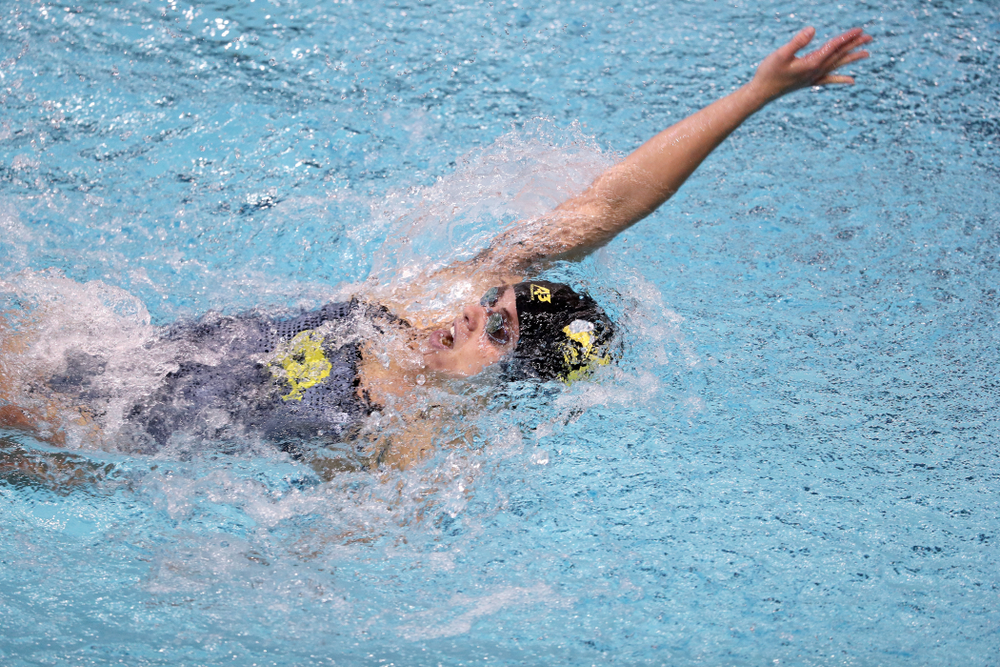 IowaÕs Kennedy Gilbertson competes in the 100 yard backstroke against Notre Dame and Illinois Saturday, January 11, 2020 at the Campus Recreation and Wellness Center. (Brian Ray/hawkeyesports.com)