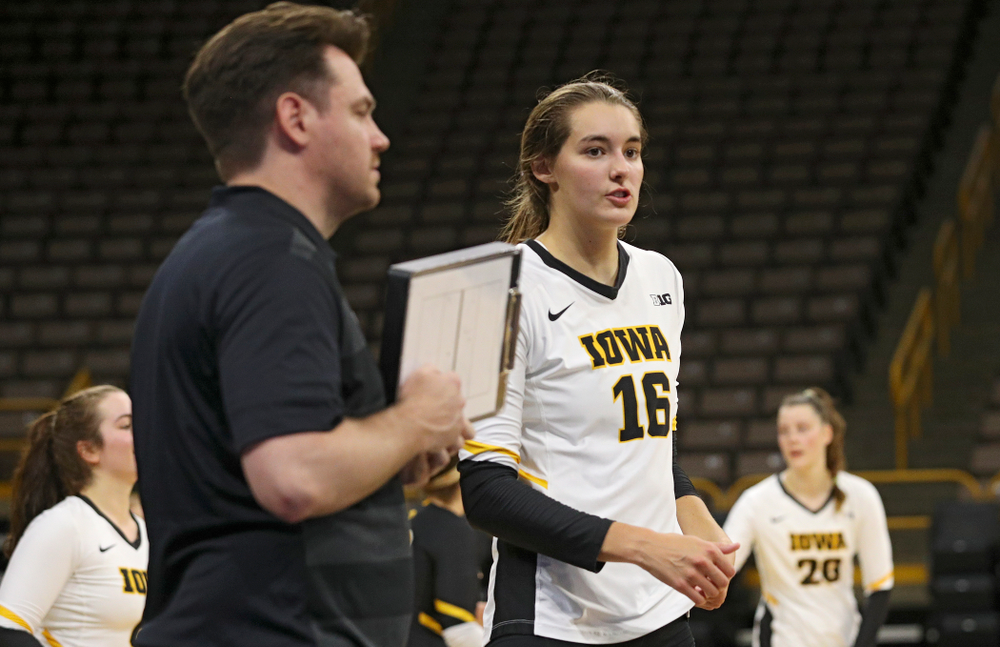 Iowa’s Grace Tubbs (16) talks with assistant coach Bobby Hughes during the second set of the Black and Gold scrimmage at Carver-Hawkeye Arena in Iowa City on Saturday, Aug 24, 2019. (Stephen Mally/hawkeyesports.com)