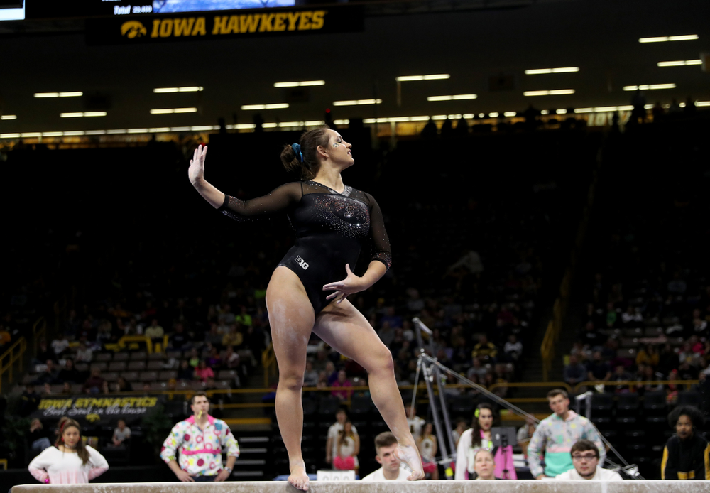 Iowa’s Dani Castillo competes on the beam against Michigan Friday, February 14, 2020 at Carver-Hawkeye Arena. (Brian Ray/hawkeyesports.com)