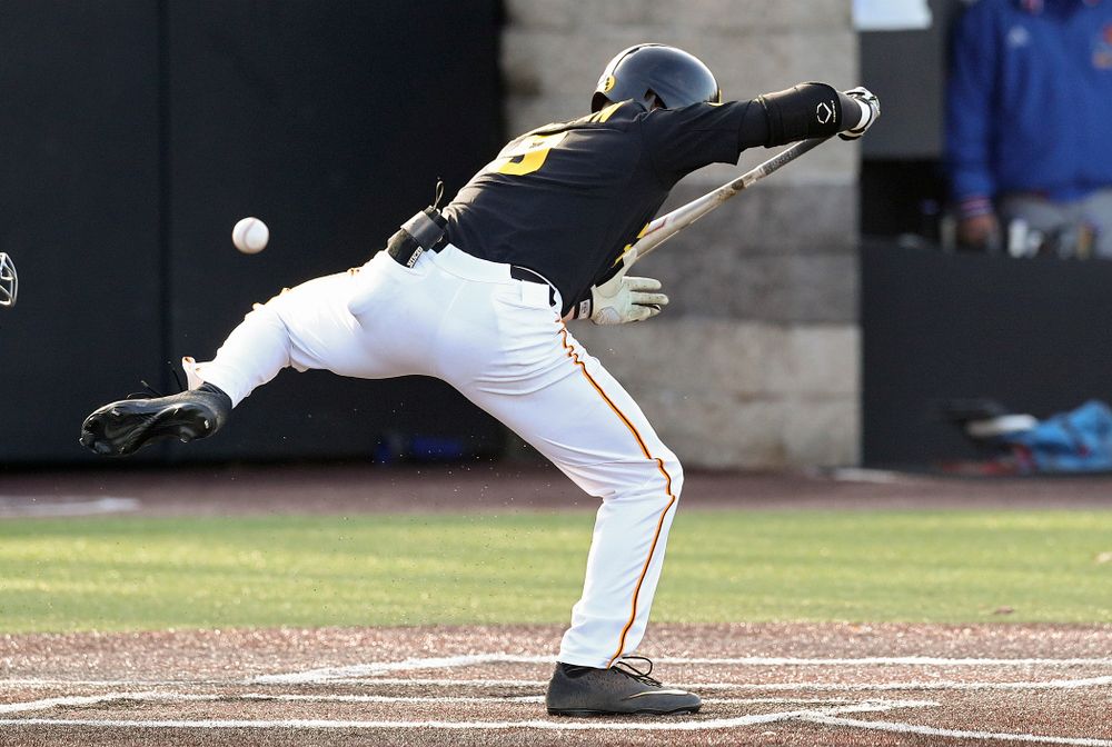 Iowa outfielder Ben Norman (9) is hit by a pitch during the fourth inning of their college baseball game at Duane Banks Field in Iowa City on Tuesday, March 10, 2020. (Stephen Mally/hawkeyesports.com)