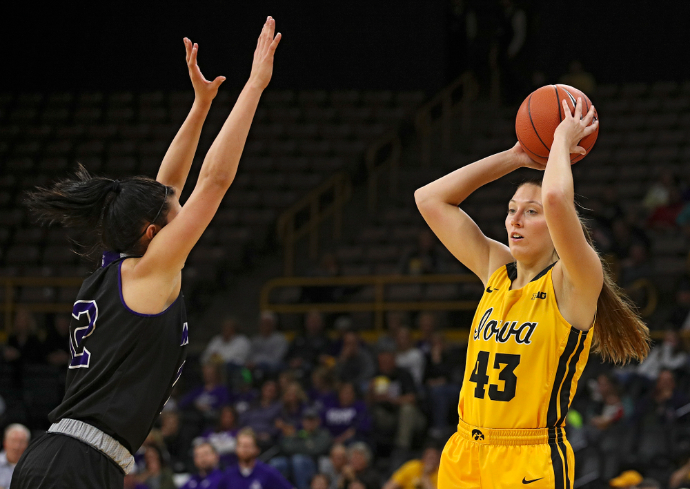 Iowa forward Amanda Ollinger (43) looks to pass during the third quarter of their game against Winona State at Carver-Hawkeye Arena in Iowa City on Sunday, Nov 3, 2019. (Stephen Mally/hawkeyesports.com)