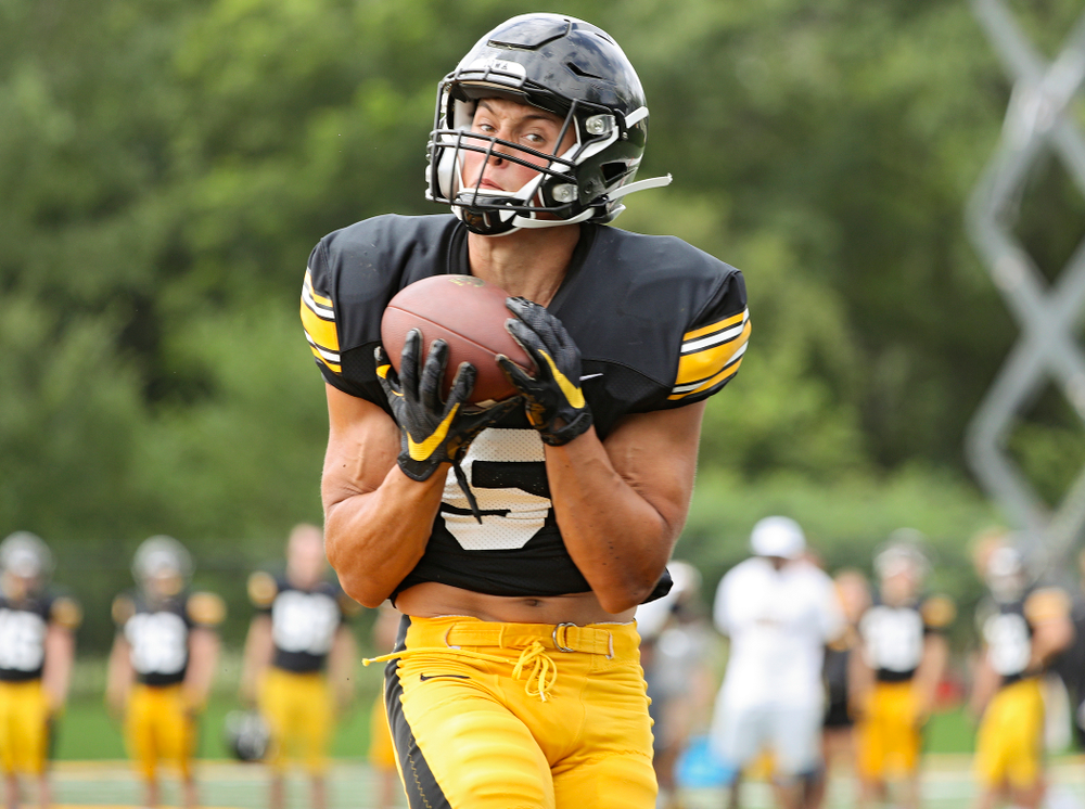 Iowa Hawkeyes wide receiver Oliver Martin (5) pulls in a touchdown pass during Fall Camp Practice No. 10 at the Hansen Football Performance Center in Iowa City on Tuesday, Aug 13, 2019. (Stephen Mally/hawkeyesports.com)