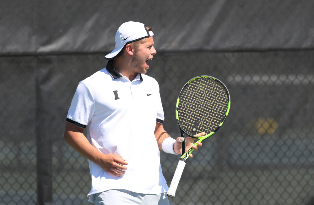 IowaÕs Oliver Okonkwo and Will Davies play a doubles match against the Michigan Wolverines Sunday, April 21, 2019 at the Hawkeye Tennis and Recreation Complex. (Brian Ray/hawkeyesports.com)