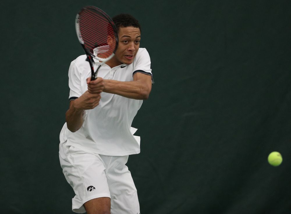 Iowa's Oliver Okonkwo against North Dakota Friday, January 25, 2019 at the Hawkeye Tennis and Recreation Complex. (Brian Ray/hawkeyesports.com)