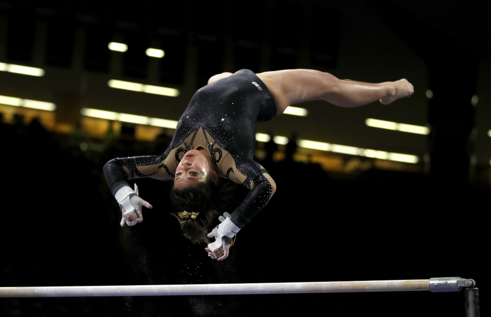 Iowa's Nicole Chow competes on the bars during their meet against Southeast Missouri State Friday, January 11, 2019 at Carver-Hawkeye Arena. (Brian Ray/hawkeyesports.com)