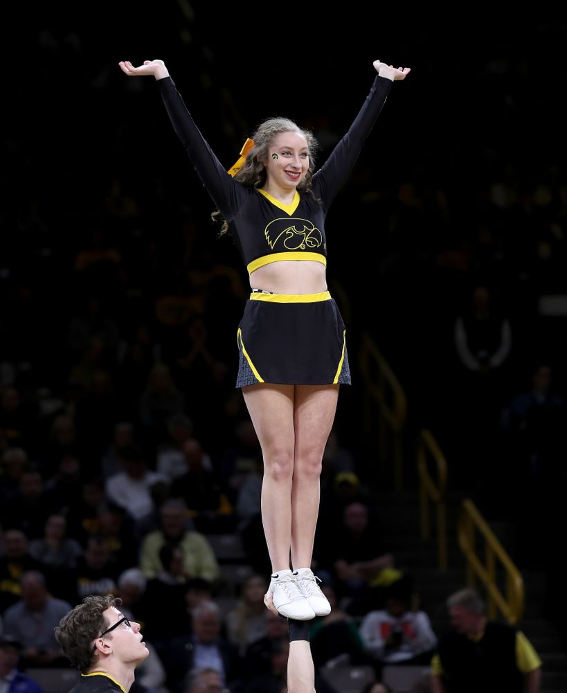 The Iowa Cheerleaders and Dance Team perform on senior night at half-time of the Iowa Hawkeyes game against the Purdue Boilermakers Tuesday, March 3, 2020 at Carver-Hawkeye Arena. (Brian Ray/hawkeyesports.com)