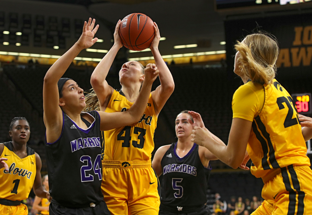 Iowa forward Amanda Ollinger (43) makes a basket during the fourth quarter of their game against Winona State at Carver-Hawkeye Arena in Iowa City on Sunday, Nov 3, 2019. (Stephen Mally/hawkeyesports.com)