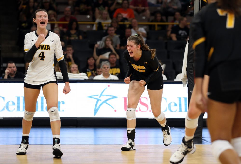 Iowa Hawkeyes defensive specialist Halle Johnston (4) and outside hitter Edina Schmidt (20) against the Iowa State Cyclones Saturday, September 21, 2019 at Carver-Hawkeye Arena. (Brian Ray/hawkeyesports.com)