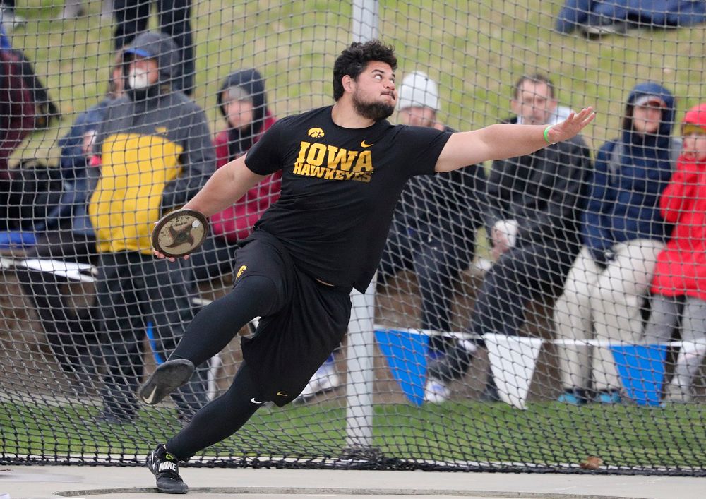 Iowa's Reno Tuufuli throws in the men's discus event during the third day of the Drake Relays at Drake Stadium in Des Moines on Saturday, Apr. 27, 2019. (Stephen Mally/hawkeyesports.com)