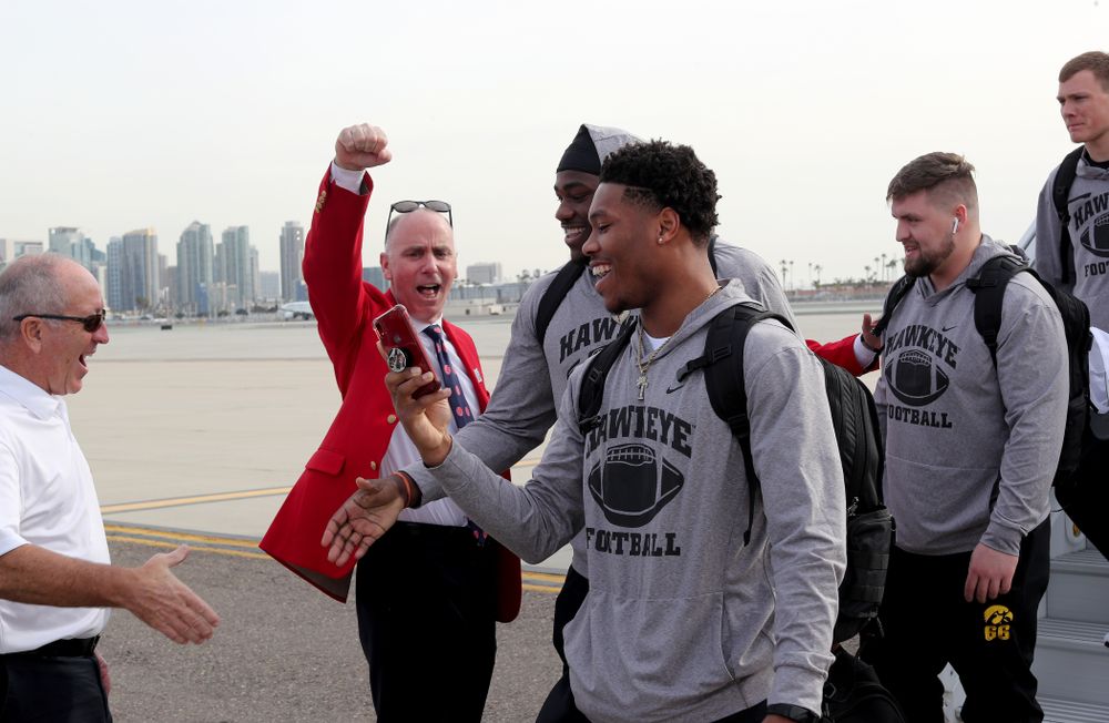 Iowa Hawkeyes wide receiver Tyrone Tracy Jr. (3) and defensive tackle Daviyon Nixon (54) after arriving in San Diego, CA Saturday, December 21, 2019 for the Holiday Bowl. (Brian Ray/hawkeyesports.com)
