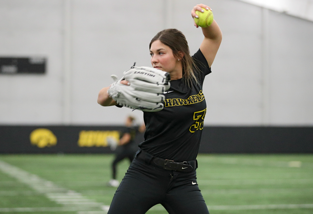 Iowa outfielder Riley Sheehy (33) warms up for practice during Iowa Softball Media Day at the Hawkeye Tennis and Recreation Complex in Iowa City on Thursday, January 30, 2020. (Stephen Mally/hawkeyesports.com)