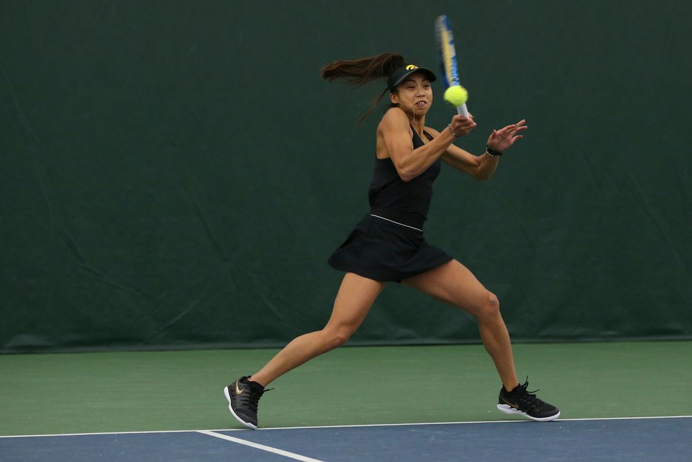 Iowa’s Michelle Bacalla returns a hit during the Iowa women’s tennis meet vs UNI on Saturday, February 29, 2020 at the Hawkeye Tennis and Recreation Complex. (Lily Smith/hawkeyesports.com)