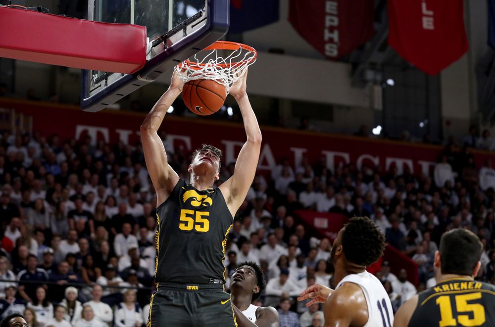 Iowa Hawkeyes forward Luka Garza (55) dunks the ball against Penn State Saturday, January 4, 2020 at the Palestra in Philadelphia. (Brian Ray/hawkeyesports.com)