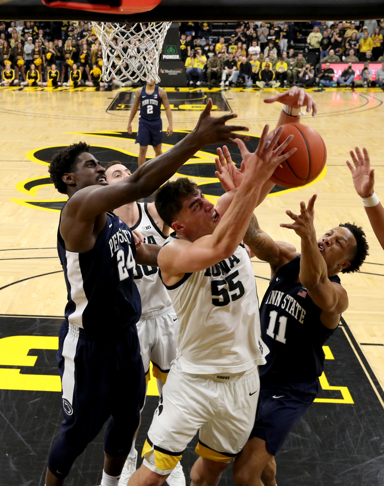 Iowa Hawkeyes forward Luka Garza (55) battles for a rebound against Penn State Saturday, February 29, 2020 at Carver-Hawkeye Arena. (Brian Ray/hawkeyesports.com)
