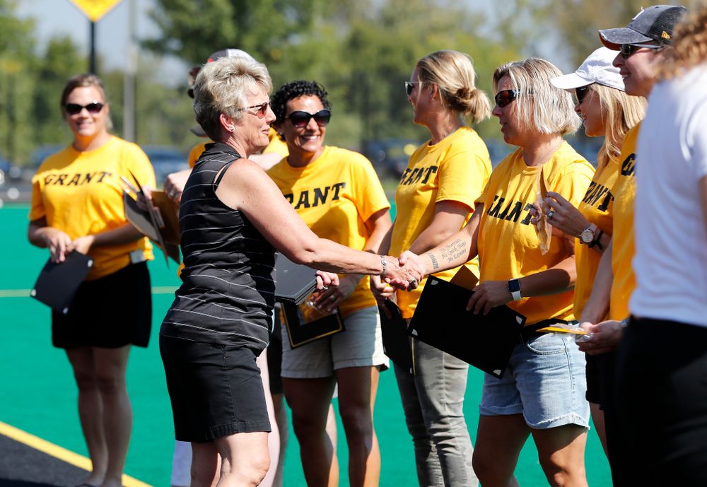 Former field hockey players receive their varsity letters before the Iowa Hawkeyes game against Indiana Sunday, September 16, 2018 at Grant Field. (Brian Ray/hawkeyesports.com)