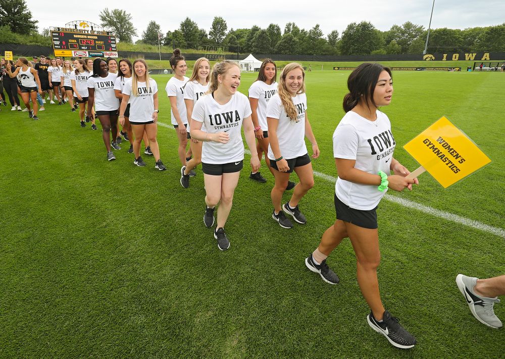 Student-athletes walk in the Parade of Champions during the Student-Athlete Kickoff at the Iowa Soccer Complex in Iowa City on Sunday, Aug 25, 2019. (Stephen Mally/hawkeyesports.com)