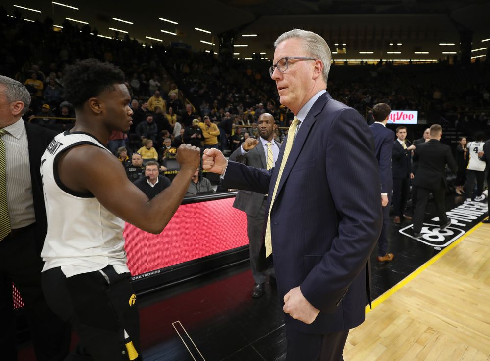 Iowa Hawkeyes head coach Fran McCaffery and guard Joe Toussaint (1) against the Minnesota Golden Gophers Monday, December 9, 2019 at Carver-Hawkeye Arena. (Brian Ray/hawkeyesports.com)