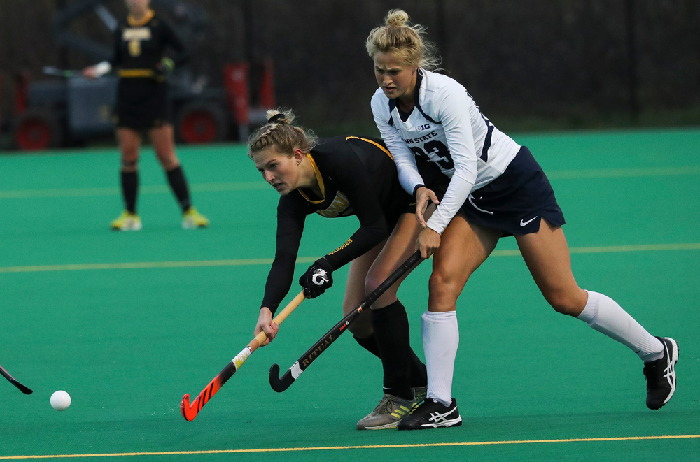 Iowa Hawkeyes midfielder Ellie Holley (7) passes the ball during a game against No. 6 Penn State at Grant Field on October 12, 2018. (Tork Mason/hawkeyesports.com)