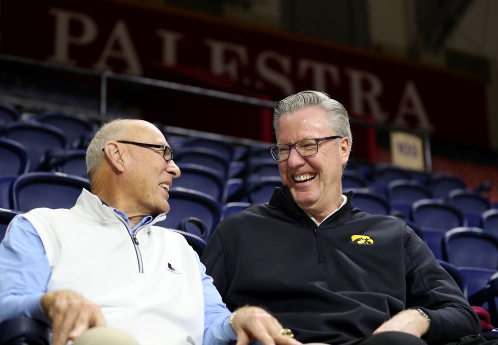 Iowa Hawkeyes head coach Fran McCaffery talks with Bob Weinhauer, his head coach from Penn, before practice at the Palestra Friday, January 3, 2020 in Philadelphia. (Brian Ray/hawkeyesports.com)