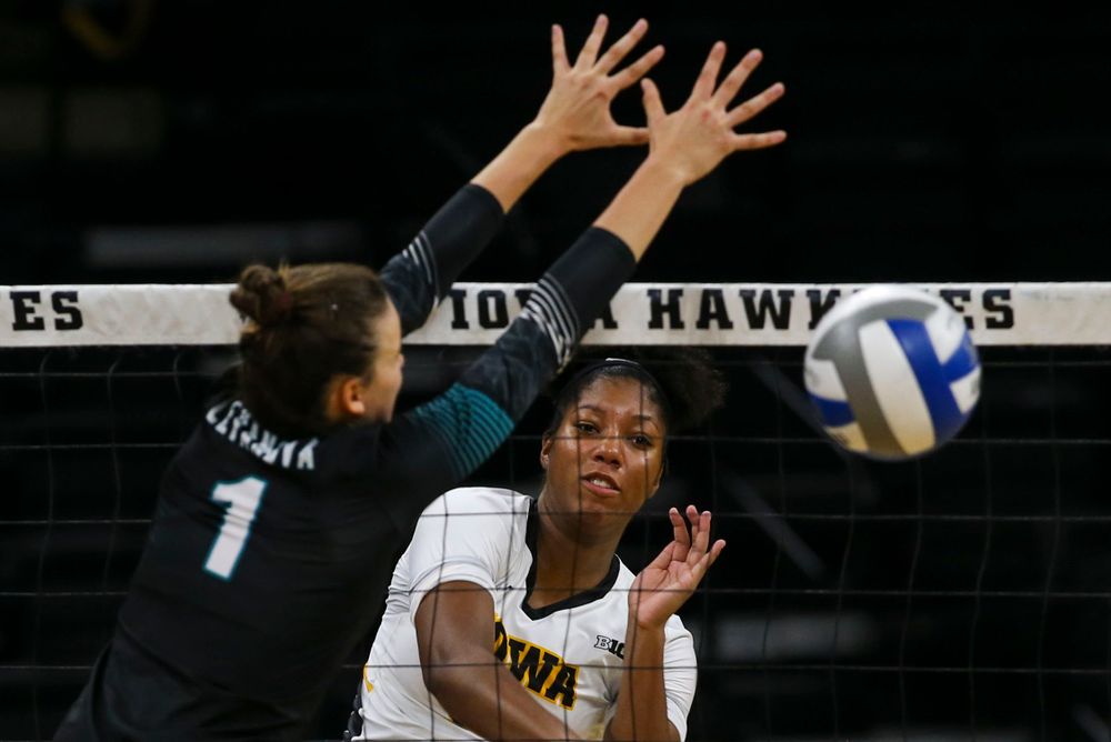 Iowa Hawkeyes middle blocker Amiya Jones (9) against Coastal Carolina Friday, September 20, 2019 at Carver-Hawkeye Arena. (Lily Smith/hawkeyesports.com)