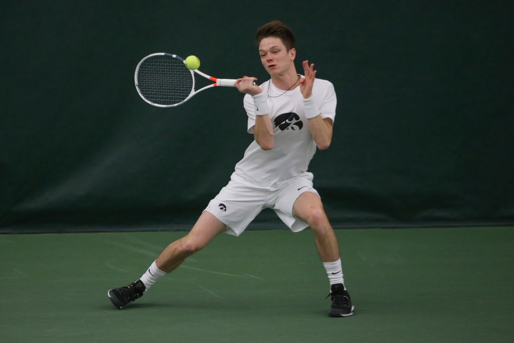 Iowa’s Jason Kerst returns a hit during the Iowa men’s tennis meet vs Nebraska on Sunday, March 1, 2020 at the Hawkeye Tennis and Recreation Complex. (Lily Smith/hawkeyesports.com)