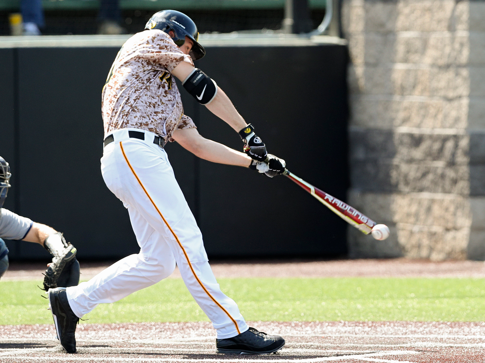 Iowa Hawkeyes right fielder Connor McCaffery (30) drives a pitch for a hit during the fifth inning of their game against UC Irvine at Duane Banks Field in Iowa City on Sunday, May. 5, 2019. (Stephen Mally/hawkeyesports.com)