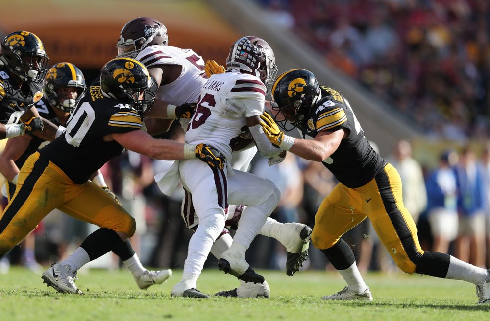 Iowa Hawkeyes defensive end Parker Hesse (40) and linebacker Jack Hockaday (48) during their Outback Bowl Tuesday, January 1, 2019 at Raymond James Stadium in Tampa, FL. (Brian Ray/hawkeyesports.com)